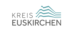 District of Euskirchen: Blue lettering. Green silhouette of the town. White background